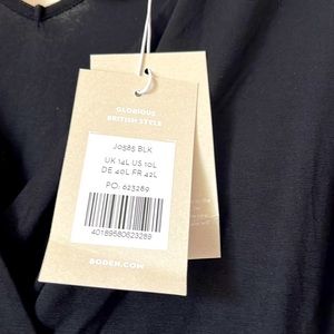 Boden US sz 10 long. Black. Double v -front and back